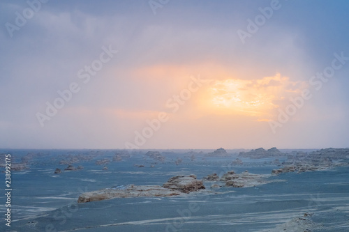 Yardang rocks in gobi desert under sunset in Dunhuang Yardang National Geopark, Gansu, China photo