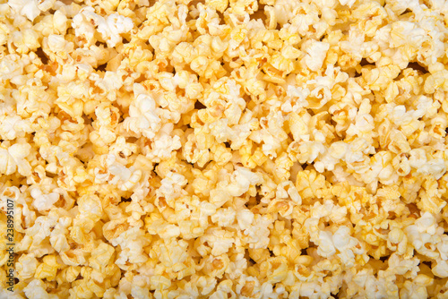 Top view flat lay background of popped popcorn.
