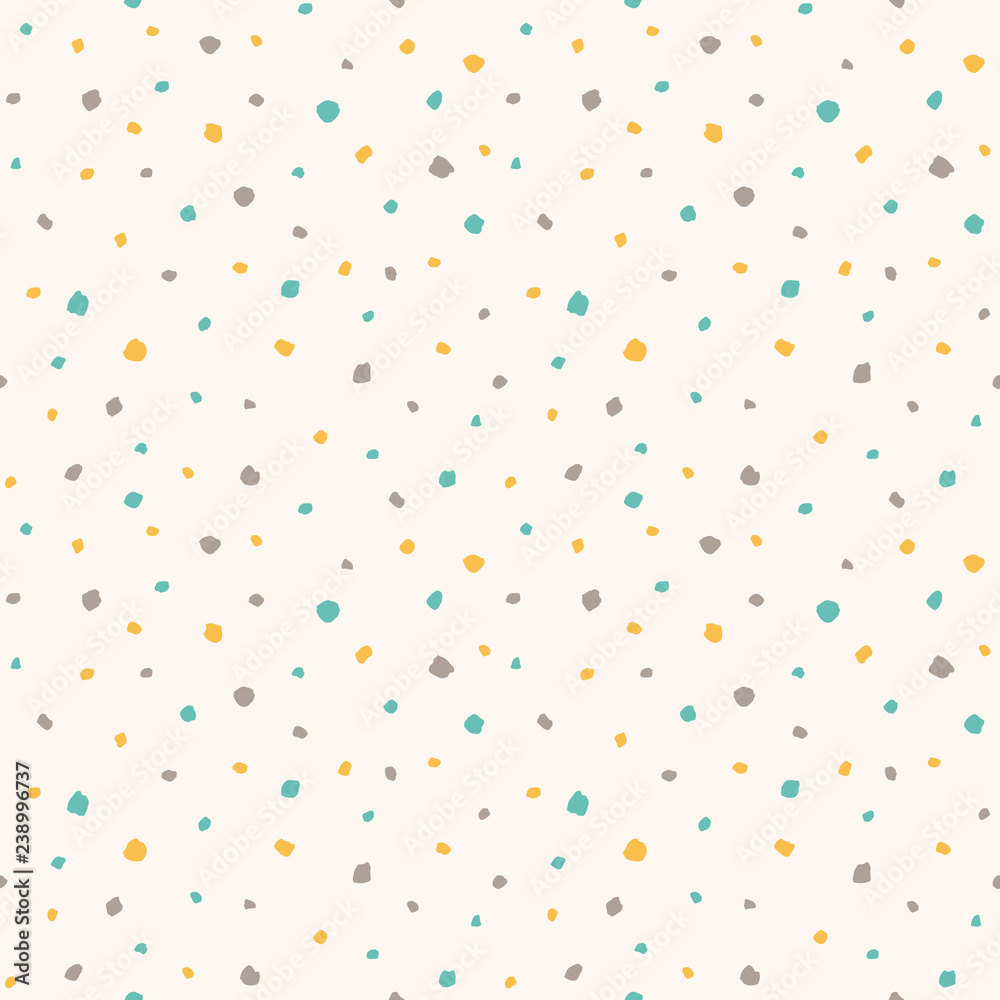 Uneven specks, spots, blobs, splashes seamless pattern. Easter background. Free hand drawn yellow, blue, brown speckles, flecks, stains or dots of different size texture. Abstract retro background.