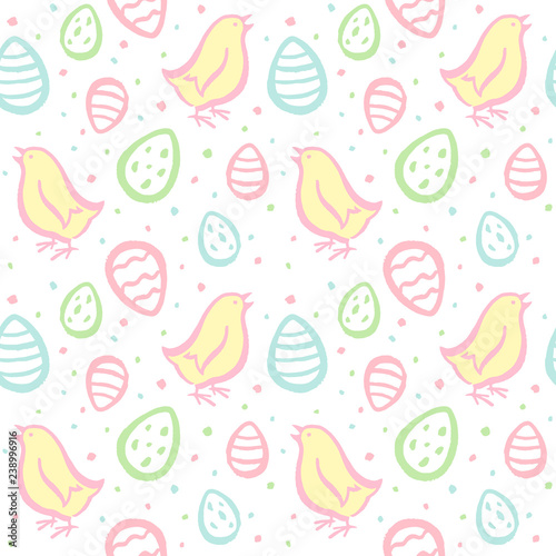 Hand drawn Easter seamless vector pattern. Brush drawn Easter eggs, cute chicks and uneven spots texture. Artistic textured uneven edges. Endless colorful background with chicken and painted eggs. 
