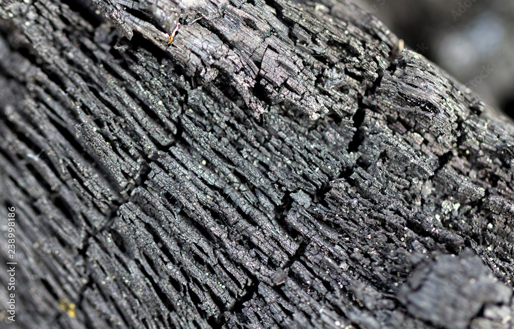 Black charcoal texture closeup for background. top wiev Black charcoal texture closeup for background. top wiev
