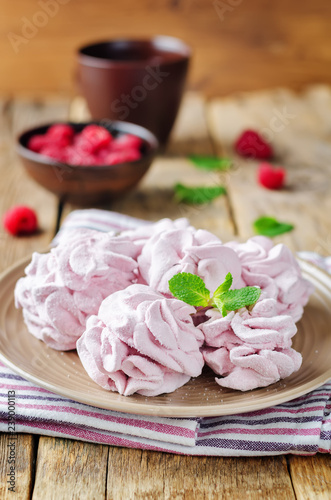 Raspberry Zephyr on a plate with fresh raspberries and mint