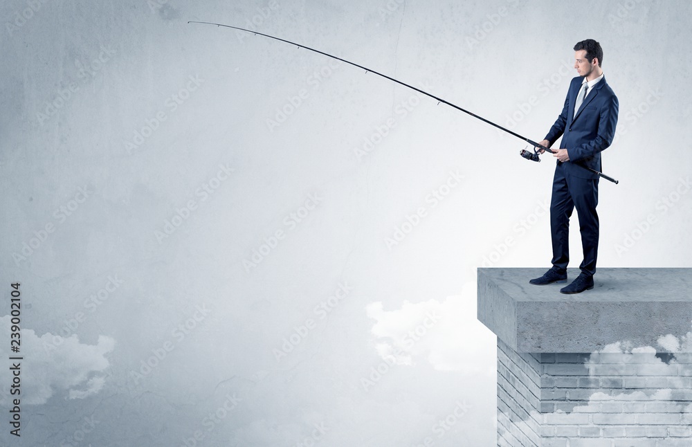 Businessman fishing nothing from the cloud with free copyspace Businessman fishing nothing from the cloud with free copyspace