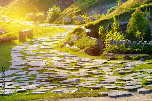 Stone pathway with beautiful sunlight photo