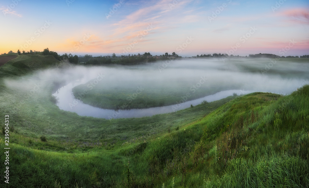 spring meadow. foggy morning in the river valley spring meadow. foggy morning in the river valley