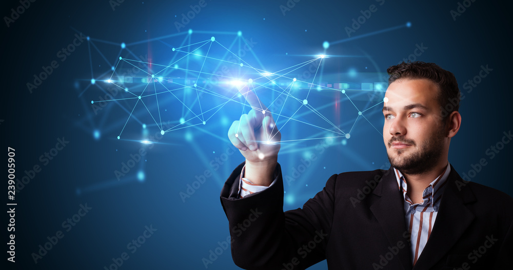 Man touching hologram screen displaying modern web system
Man touching hologram screen displaying modern web system