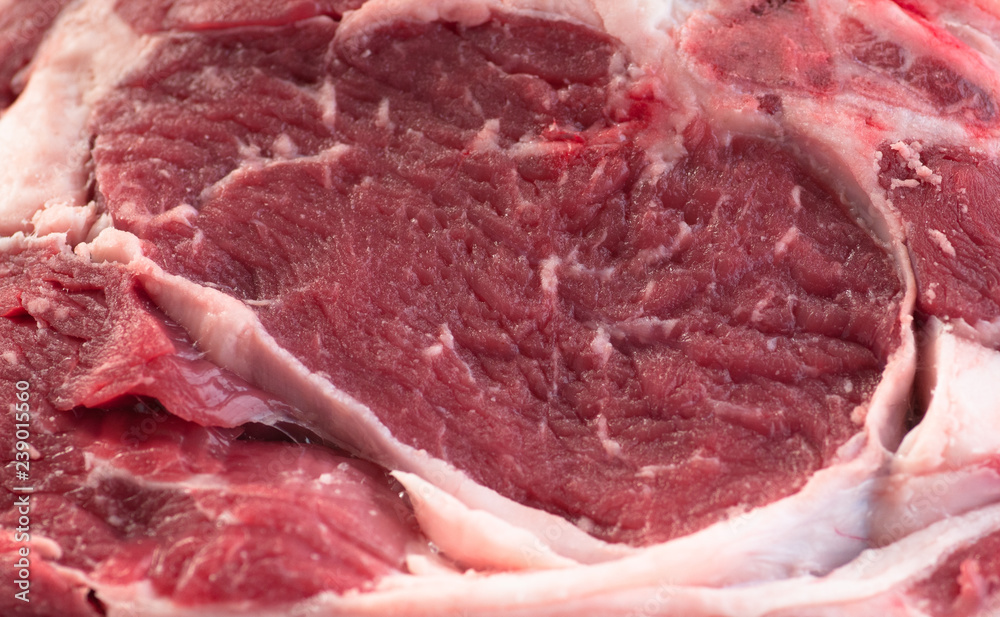 fresh meat beef. serving on a dark background fresh meat beef. serving on a dark background