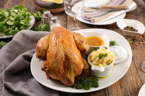 roasted chicken with mashed potato and sauce