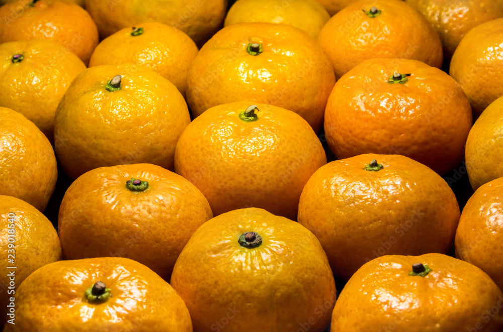 Glossy surface texture of freshness orange fruits Glossy surface texture of freshness orange fruits