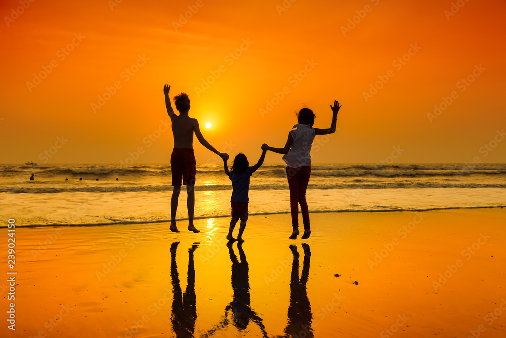 Fototapeta premium Dancing at the beach on sunset. Group of happy young people at Summer Beach Party concept. 