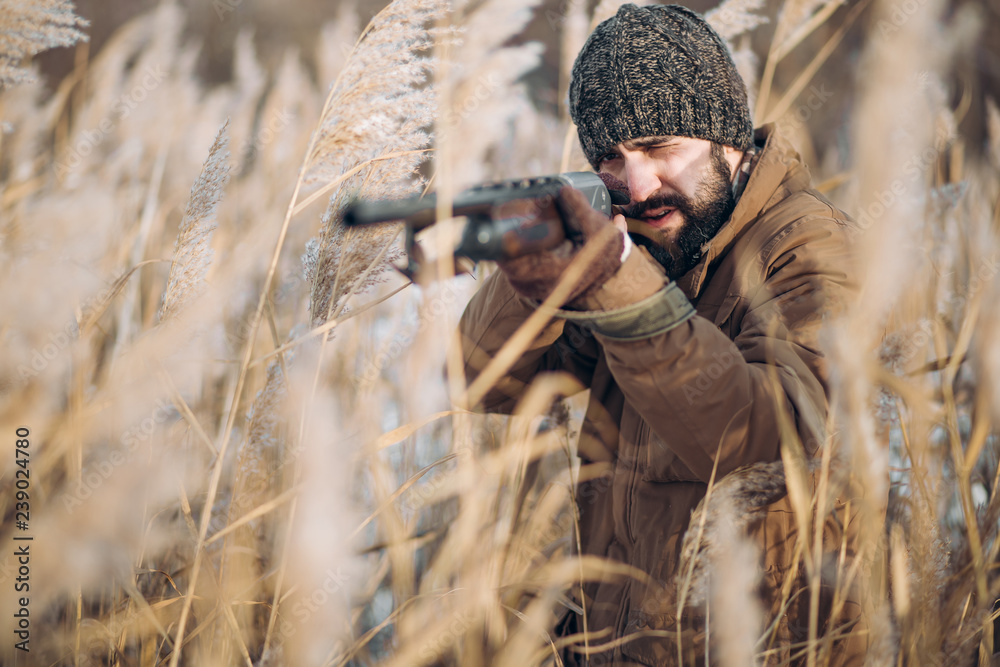young ambitious man hunting an animal for its meat. close up photo. environmental issue young ambitious man hunting an animal for its meat. close up photo. environmental issue