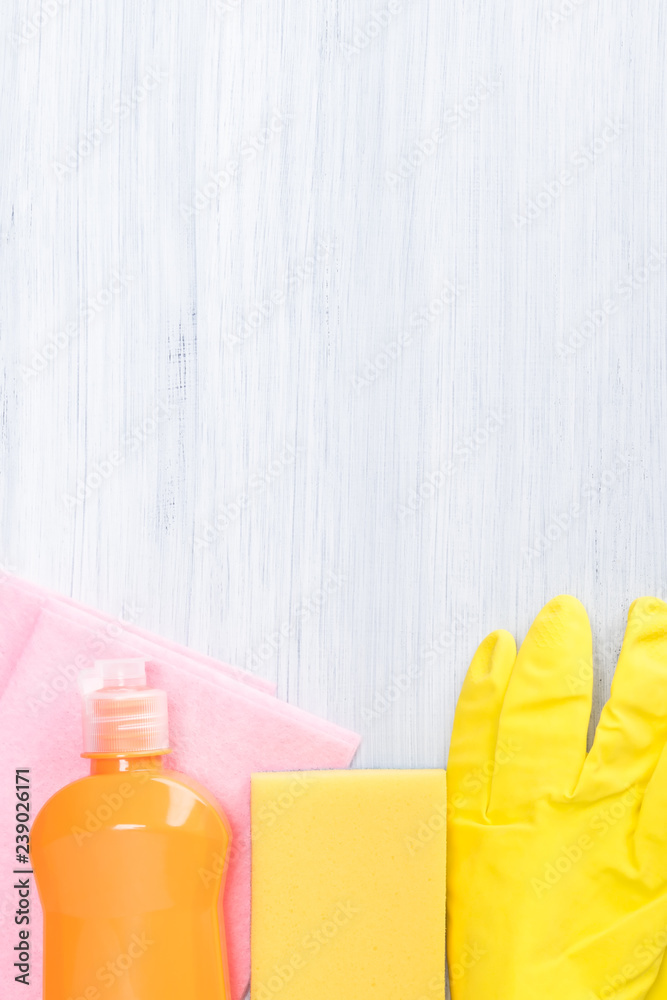 detergents and rags on a gray background, on top of a place for the inscription detergents and rags on a gray background, on top of a place for the inscription