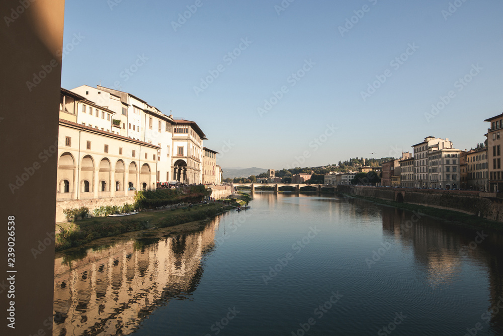 River Arno in Florence, city landscape in a sunny day with views from Ponte Vecchio