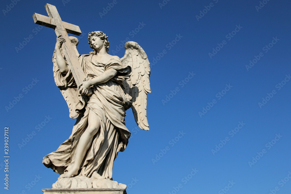 Medieval figure of an angel on the famous bridge Saint Angelo bridge, Rome, Italy