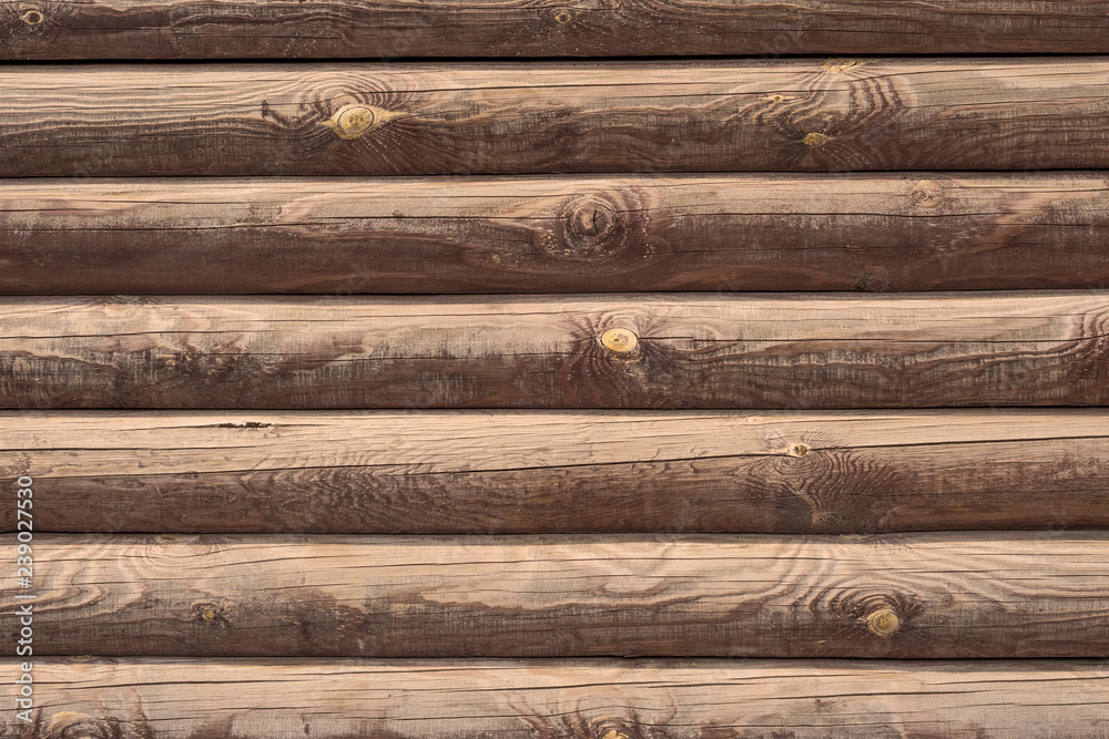 the wall is made of logs. architecture, construction. the wall is made of logs. architecture, construction.