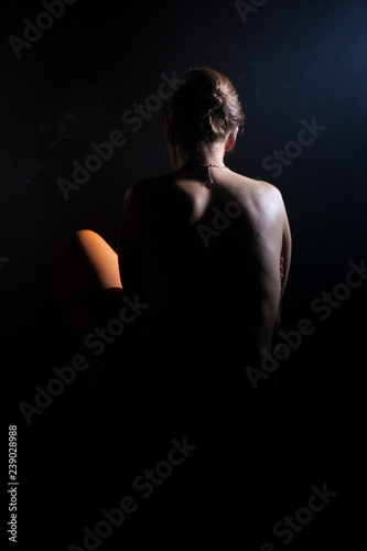 Woman under light