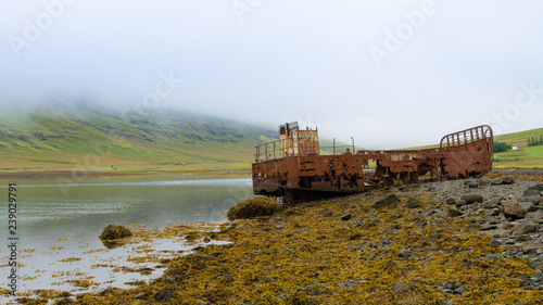 Shipwreck from Mjoifjordur fiord, east Iceland. Icelandic panorama