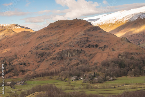 Helm Crag is a fell in the English Lake District situated in the Central Fells to the north of Grasmere. Despite its low height it sits prominently at the end of a ridge, easily seen from the village.