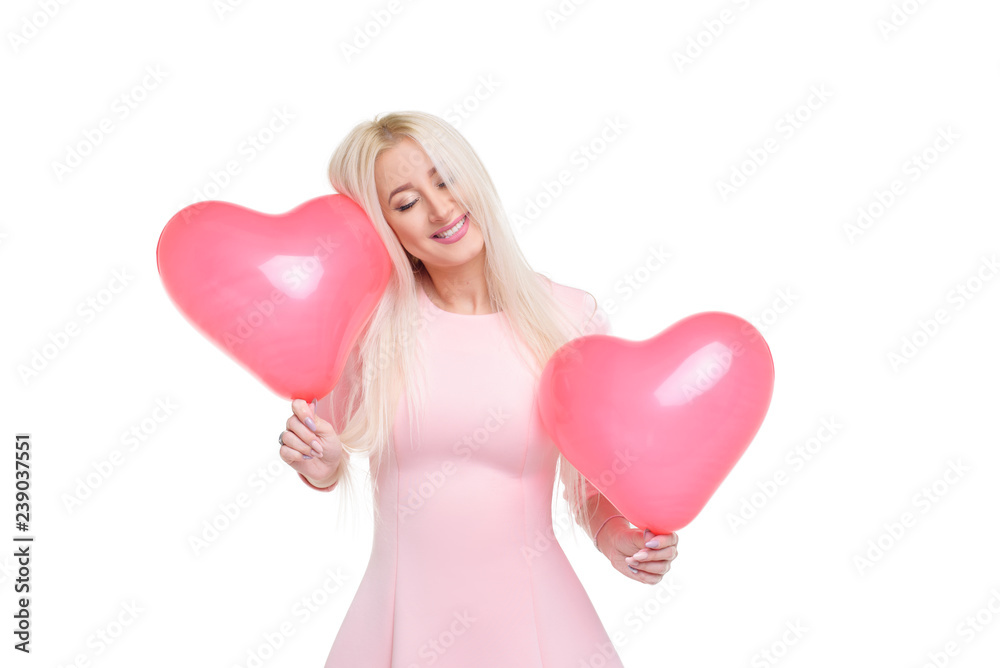Beautiful young blond woman with pink heart shape air balloons on white isolated background. Woman on Valentine's Day. Symbol of love - Image. Space for text Beautiful young blond woman with pink heart shape air balloons on white isolated background. Woman on Valentine's Day. Symbol of love - Image. Space for text