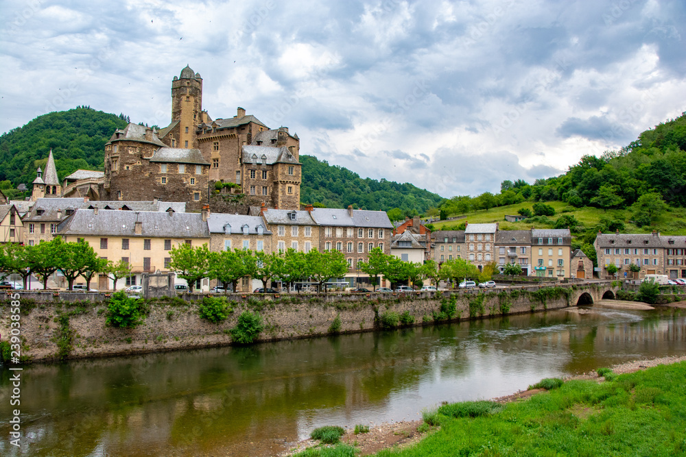 French village and chateau along the river