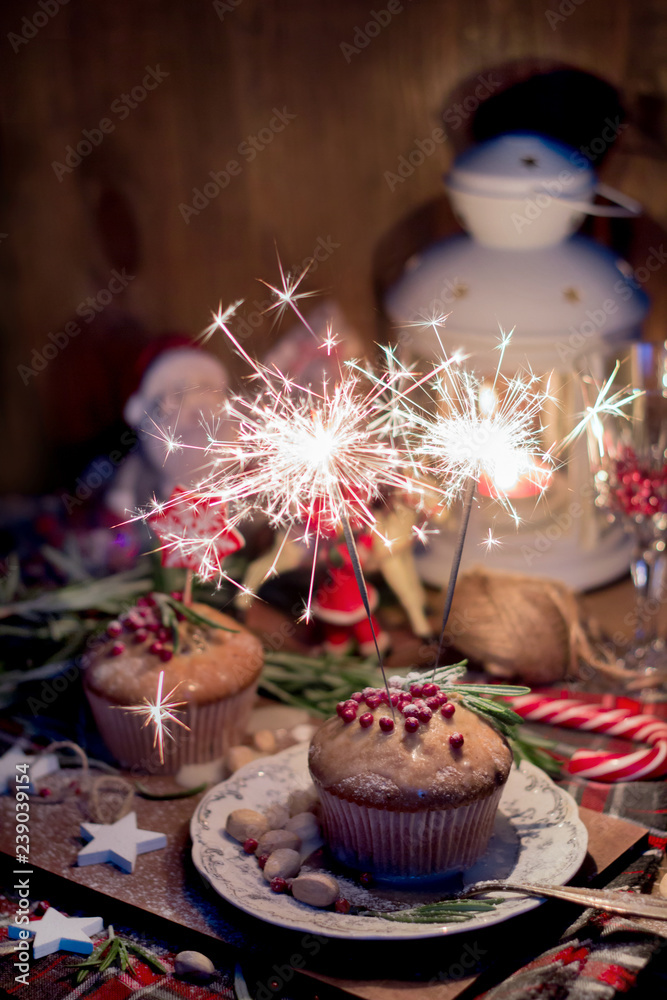 Christmas cake with sparklers and decorations