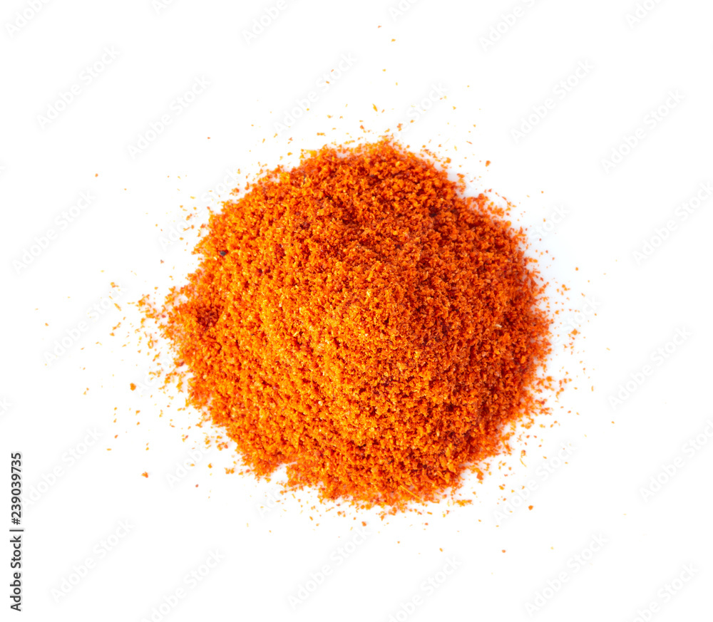 Pile of red paprika powder isolated on white background. top view Pile of red paprika powder isolated on white background. top view