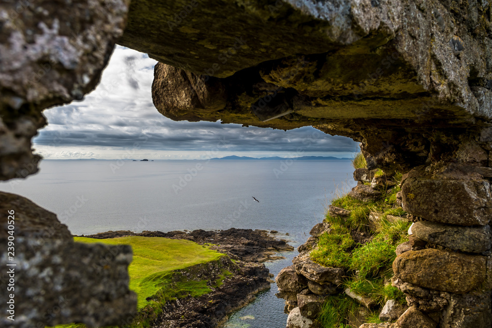 Scenic View Through Stone Window At Duntulm Castle At The Coast Of The Isle Of Skye In Scotland