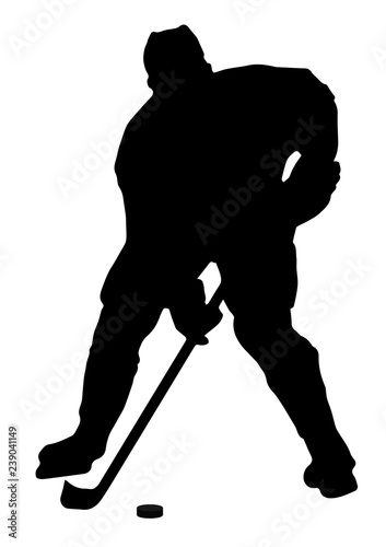 Vector drawing of a hockey player with a puck.