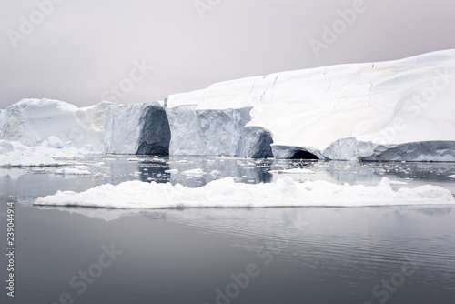 Massive iceberg on arctic ocean in greenland