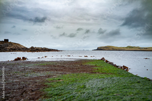 The jetty at Camus Mor at the coastline of north west Skye by Kilmuir - Scotland, United Kingdom photo