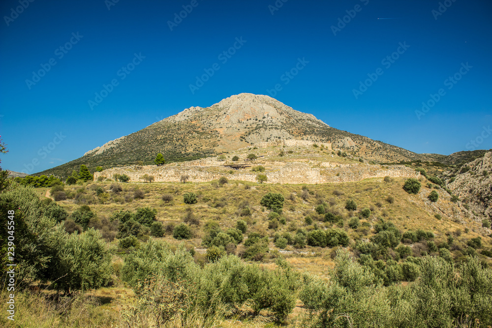 lonely mountain nature scenery landscape and ancient city ruins under it in Peloponnese area in south Europe, touristic and travel sightseeing concept