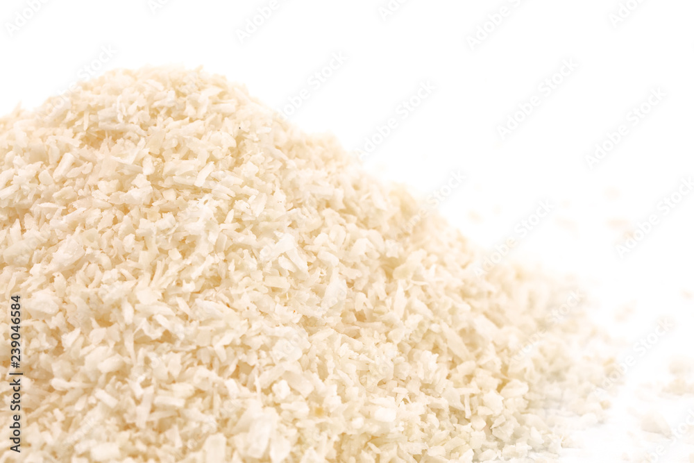 Organic Unsweetened Coconut on a White Background Organic Unsweetened Coconut on a White Background