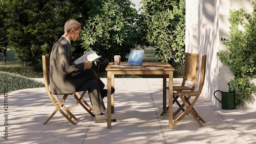 businessman working on his laptop and reading in cafe