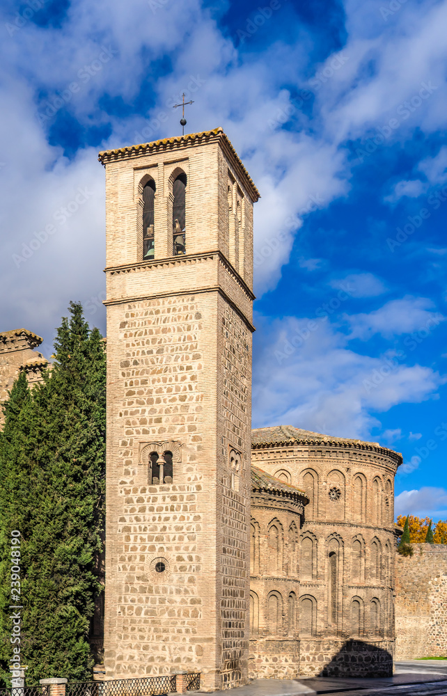 Santiago del Arrabal church in Toledo, Spain, built in 1245–48 on the site of an older church and a mosque in the Mudejar architectural style.
