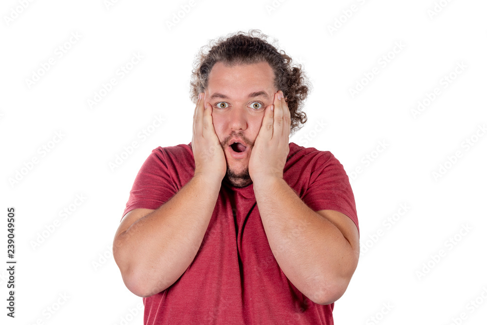 Portrait of amazed excited man doesn t believe his success, keeps hands on head, stares at camera, says omg or wow Portrait of amazed excited man doesn t believe his success, keeps hands on head, stares at camera, says omg or wow
