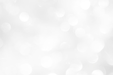 A brilliant blurry white background for a festive mood. Template for greeting card for entertainment.