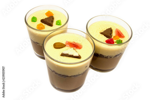 Chocolate dessert in glasses. Chocolate mousse or pudding in portion glasses with close up. Desserts for business meeting conference concept