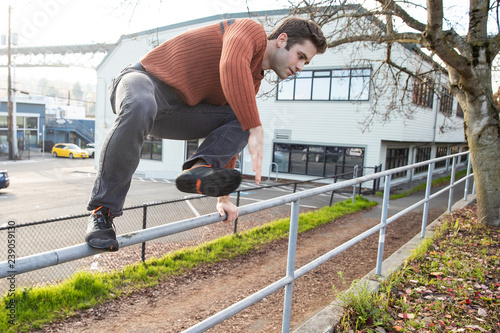 Man jumping during Parkour training outside