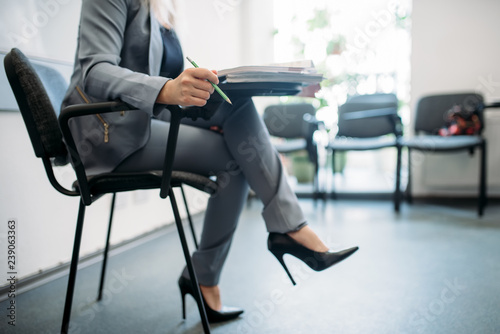 Woman passes interview in office, head hunting