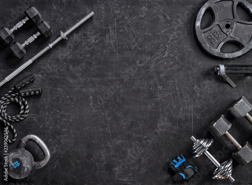 Sports equipment on a black background. Top view. Motivation
