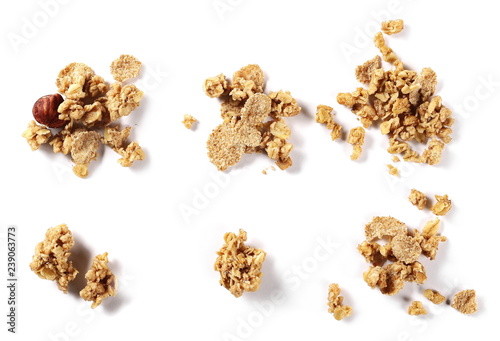 Set crunchy granola, muesli pile with nuts isolated on white background, top view