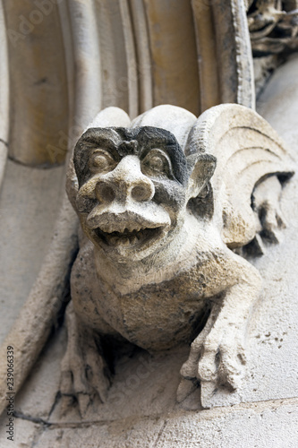 Konstfotografi Gargoyles on the wall of a medieval building.