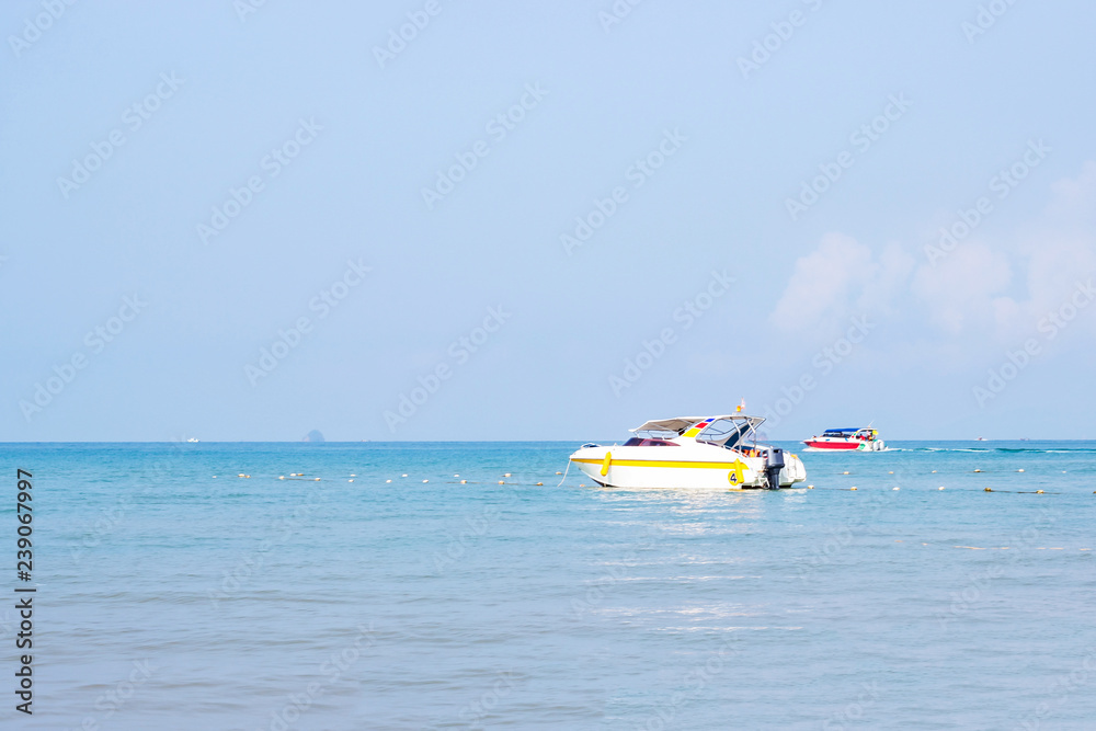 Speed boat floating in the sea around area Koh Poda after send the tourists in summer vacation.