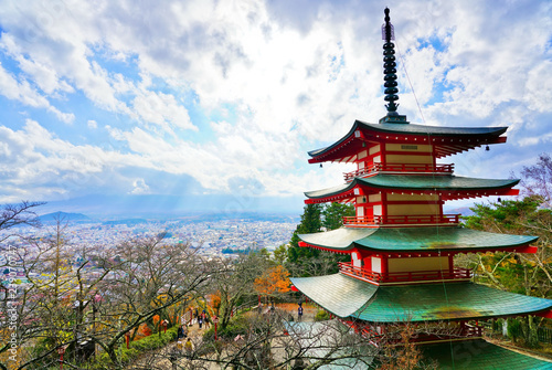 View of the Japanese temple in autumn with Mount Fuji in the background in Japan.