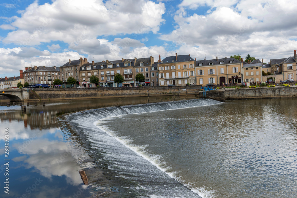 Fototapeta premium Banks of the Mayenne river, City of Laval, Mayenne, Pays de Loire, France. August 5, 2018
