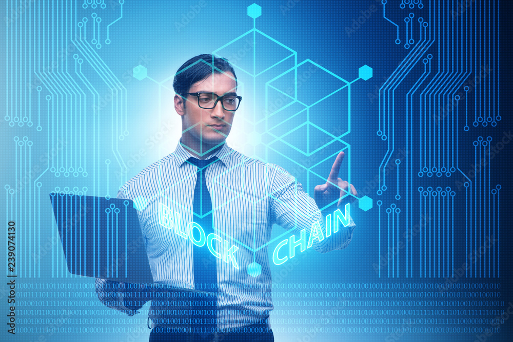 Young businessman in innovative blockchain concept Young businessman in innovative blockchain concept