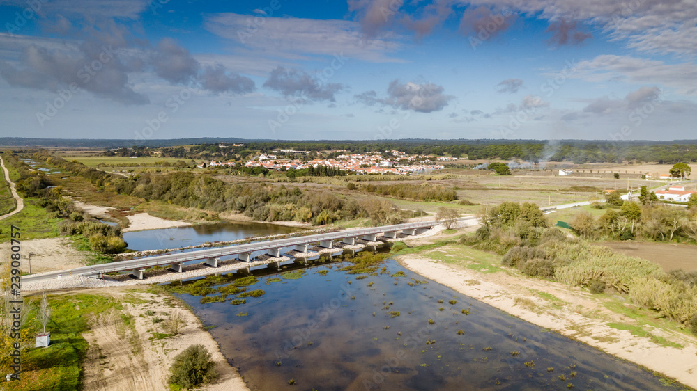 View of the Santa Justa in river sorraia bridge, Coruche Santarem Portugal. Aerial drone bird's eye view photo. View of the Santa Justa in river sorraia bridge, Coruche Santarem Portugal. Aerial drone bird's eye view photo.