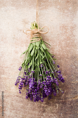 Lavender flowers  bouquet on rustic background  overhead.