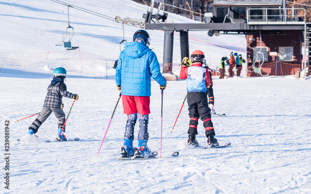 People are enjoying skiing	/ snowboarding	