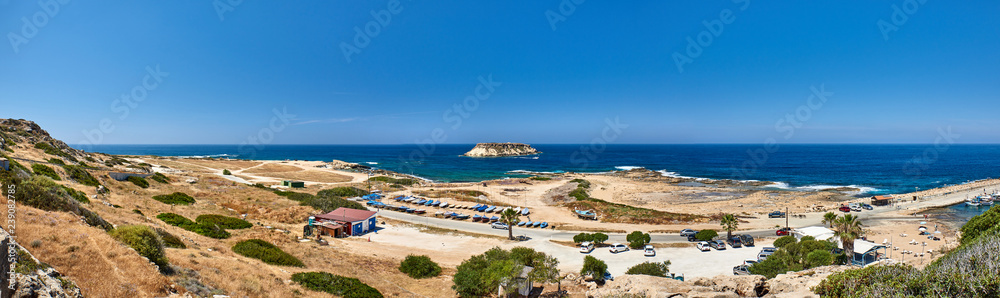 Cyprus. Peyia Cape Drepano. Panorama of the coast with the island of Kionas